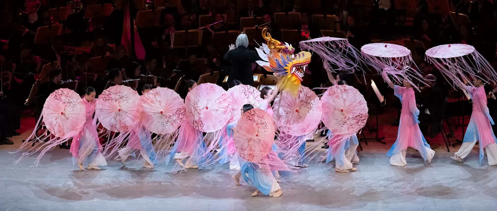 Dancers from the Yaya Danca Academy on stage with Pacific Symphony