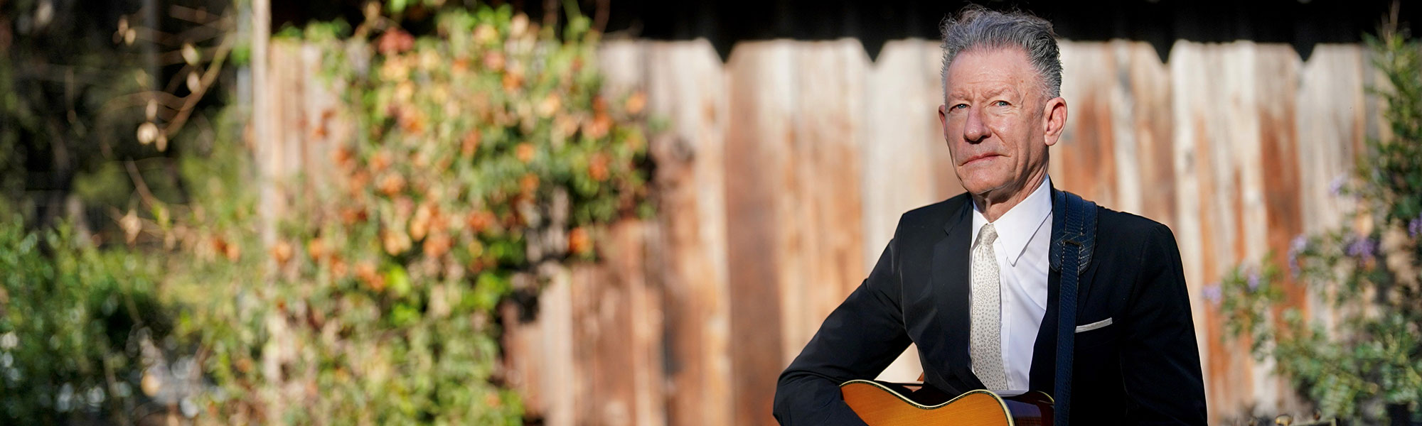 Lyle Lovett with guitar