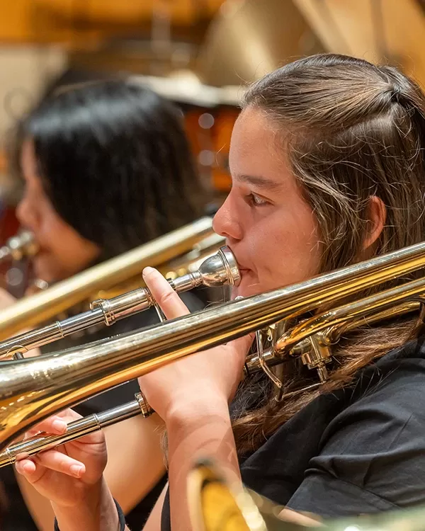 Pacific Symphony Youth Concert Band trombonists