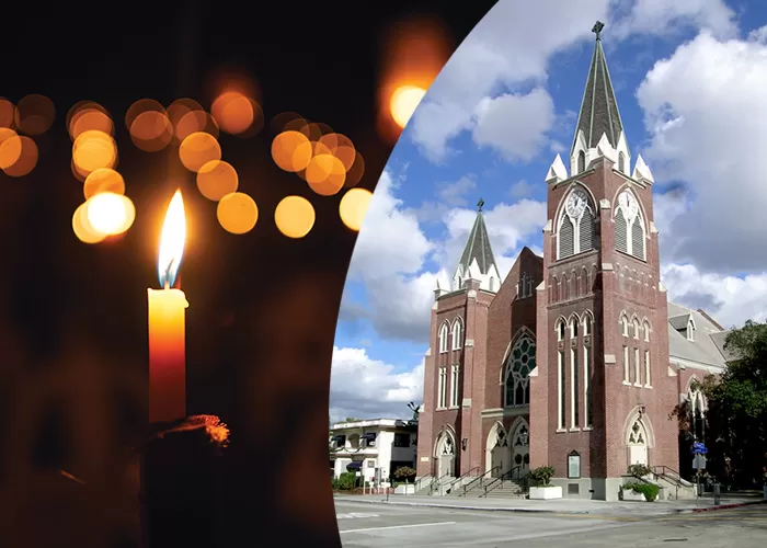 Candles and a photo of St. John's Lutheran Church of Orange