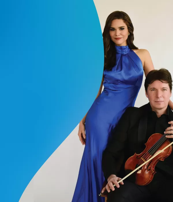 Husband and wife duo Joshua Bell and Larnsa Martinez standing next to each other.